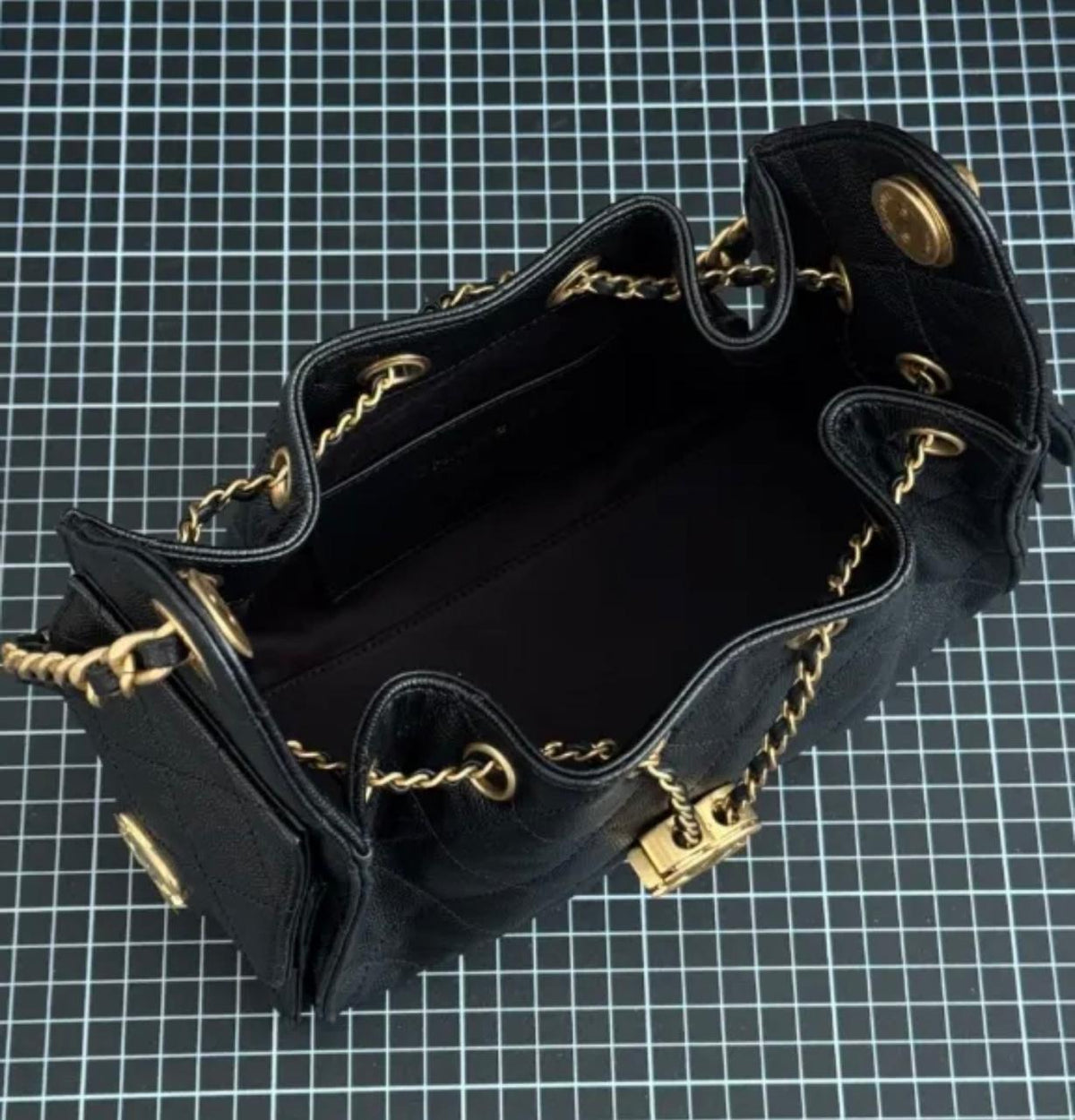 CHANEL Quilted Drawstring Bag with Chain
