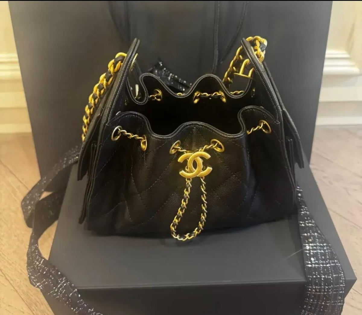 CHANEL Quilted Drawstring Bag with Chain