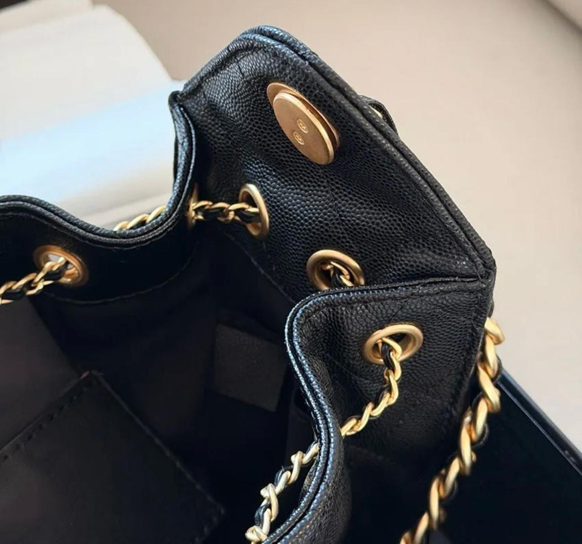 CHANEL Quilted Drawstring Bag with Chain